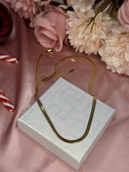 Apzeltīta plakana ķēdīte 