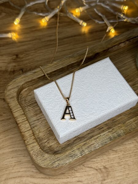 A burtiņš ar cirkonijiem, kopā ar ķēdīti - rozā zelta 